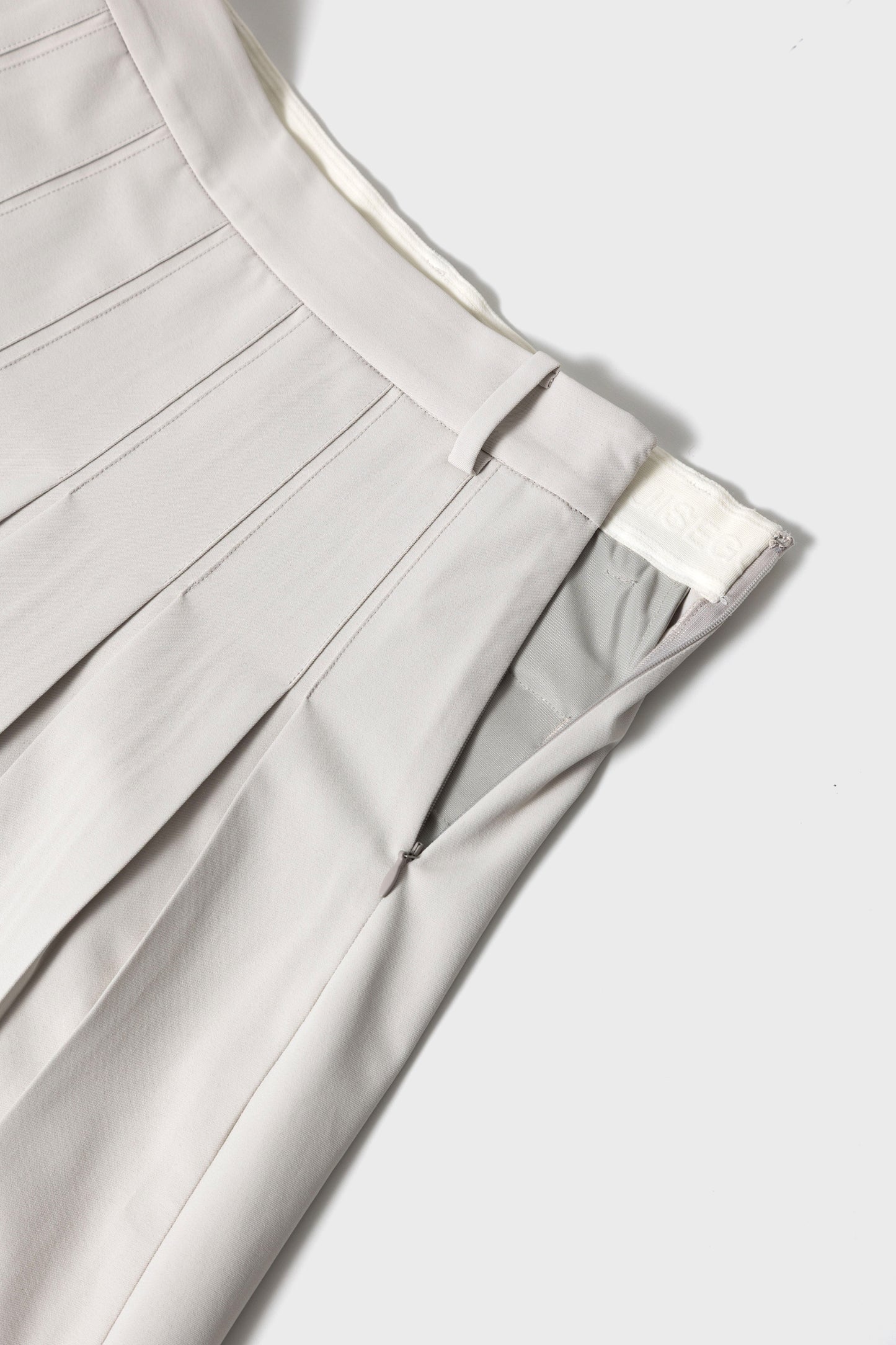 ESSENTIAL GOLF PLEATS SKIRT