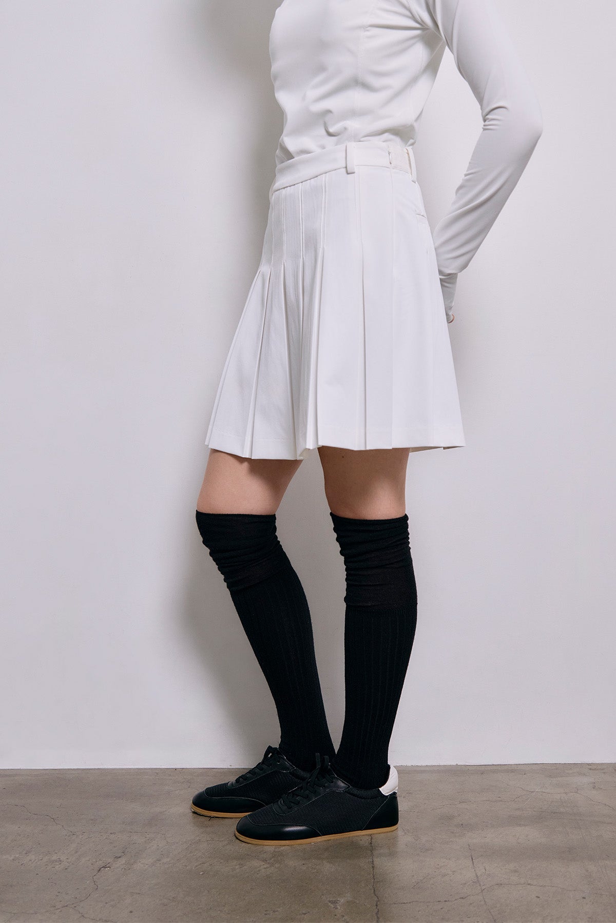 ESSENTIAL GOLF PLEATS SKIRT