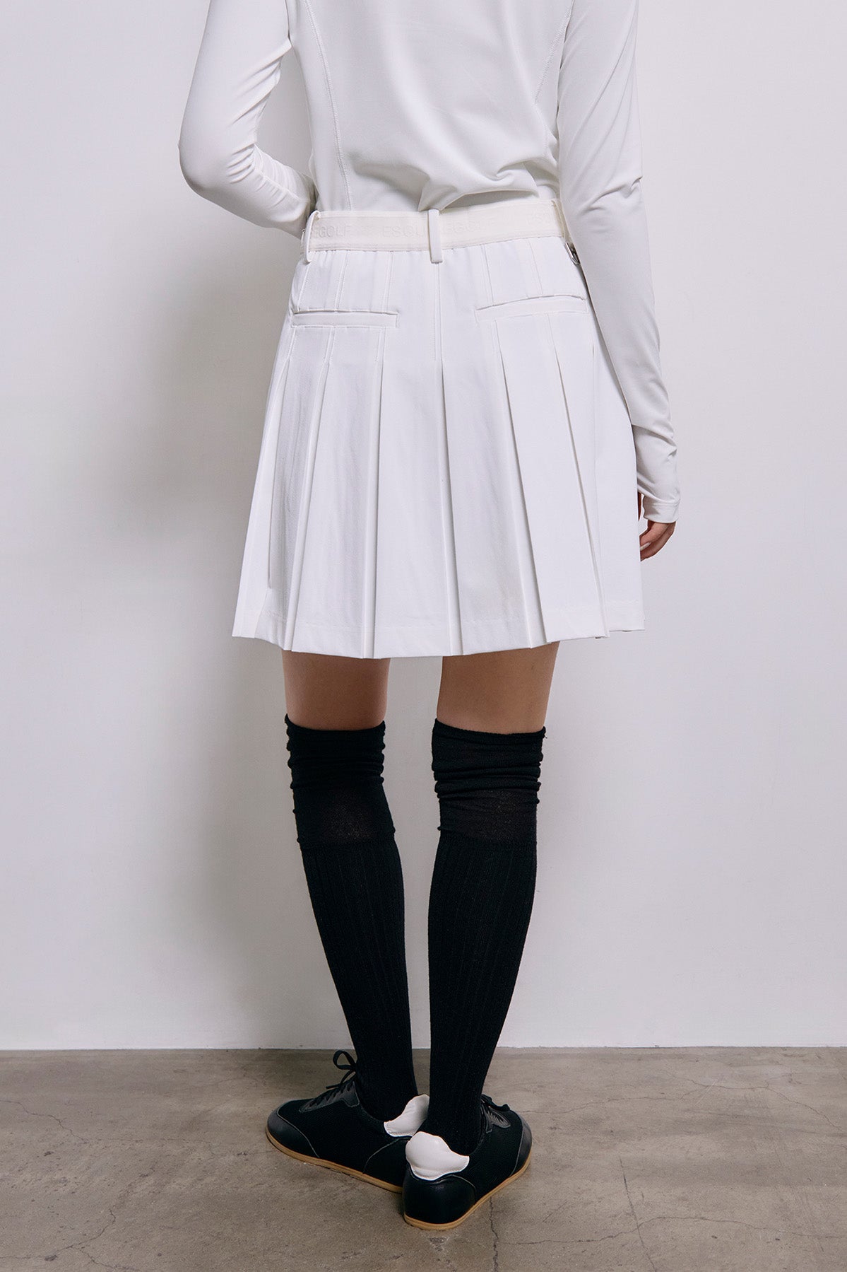 ESSENTIAL GOLF PLEATS SKIRT